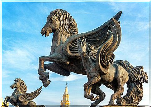 Three statues of winged horses